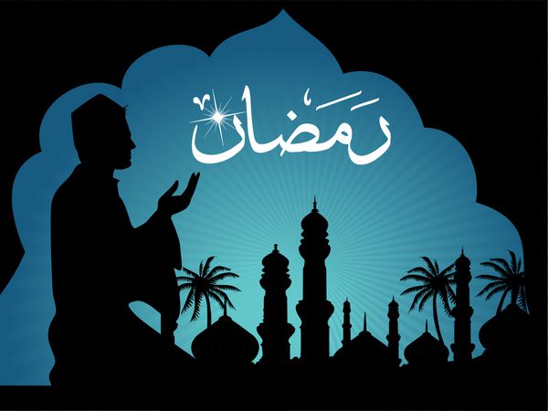 پس زمینه ماه رمضان با مرد در حال نماز شبح