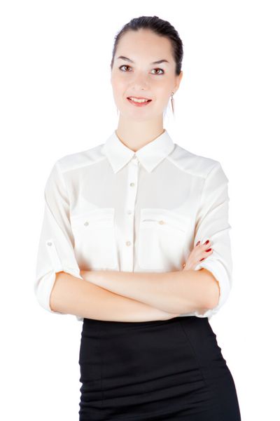 زن به سبک تجاری با بازوهای ضربدری جدا شده در پس زمینه سفید