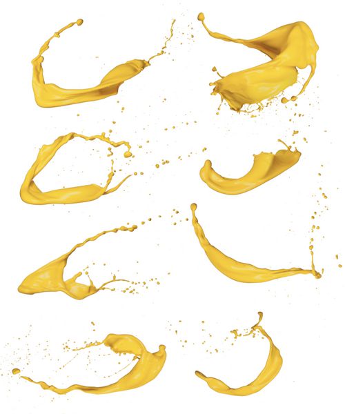عکس پاشیده شدن رنگ زرد جدا شده در زمینه سفید