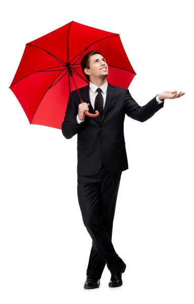 دست زدن به مرد با چتر باز باران را بررسی می کند جدا شده روی سفید