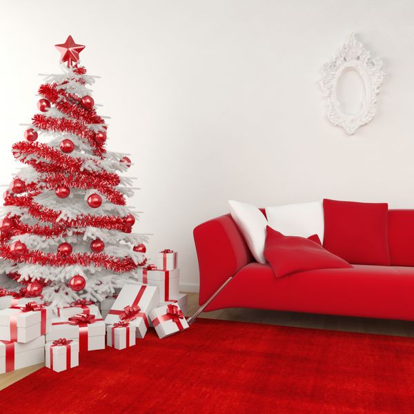 صحنه داخلی مدرن کریسمس با درخت سفید تزئین شده و کاناپه قرمز