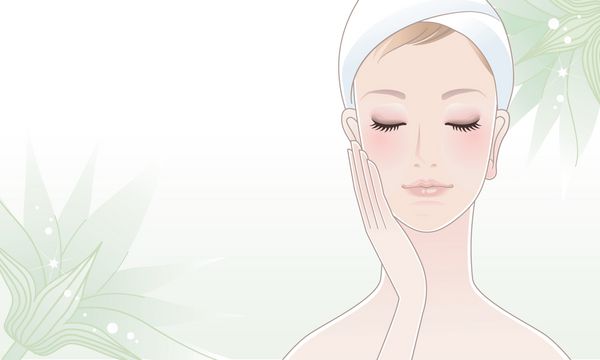 دختر زیبا زن جوان در حال لمس صورت خود با چشمان بسته در زمینه گل نیلوفر سبز مراقبت از پوست آرامش رایحه درمانی مراقبت از زیبایی ماسک گیره استفاده می شود