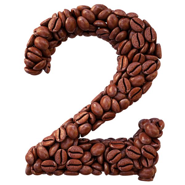 شماره از دانه های قهوه جدا شده روی سفید