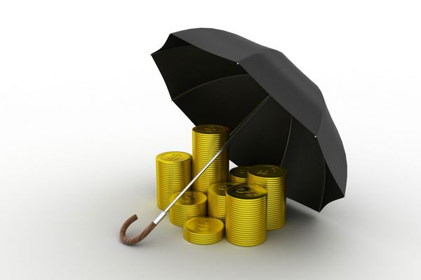 سکه های طلا زیر یک چتر سیاه