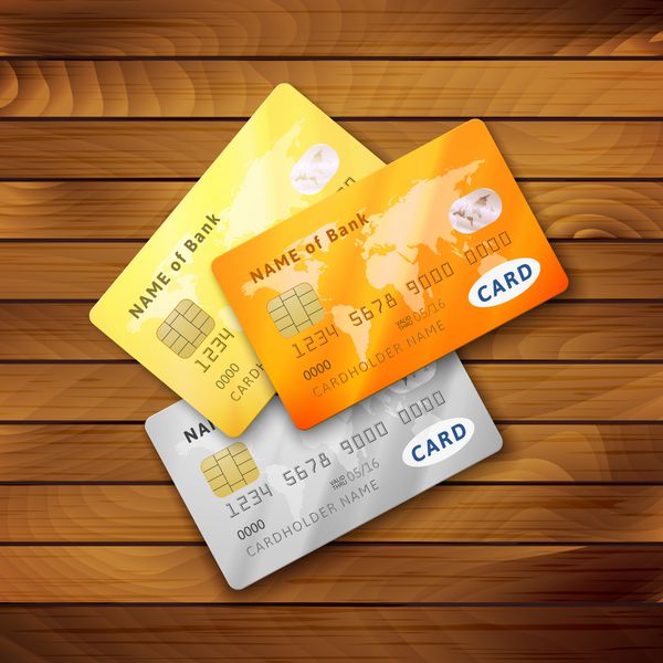 مجموعه ای از کارت های اعتباری براق دقیق رنگ نارنجی خاکستری زرد نمادهای واقع گرایانه وکتور جدا شده بر روی بافت چوب