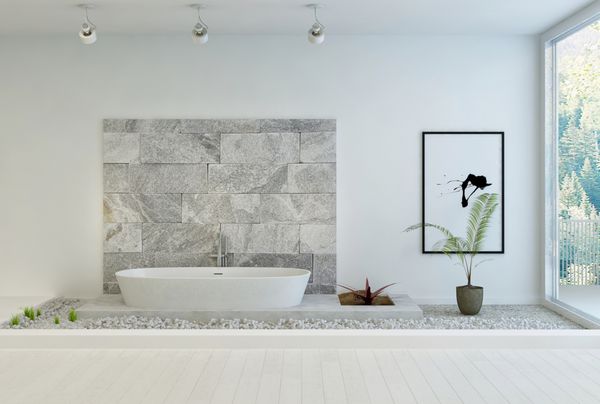 حمام مدرن سفید در طبقه با دیوار سنگی