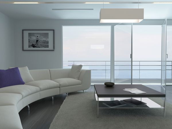 فضای داخلی اتاق نشیمن لوکس با نیمکت سفید و منظره دریا