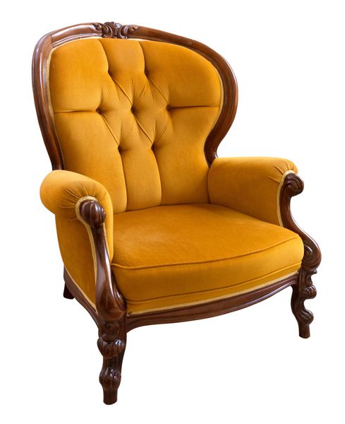 صندلی راحتی نارنجی عتیقه ایزوله شده در پس زمینه سفید