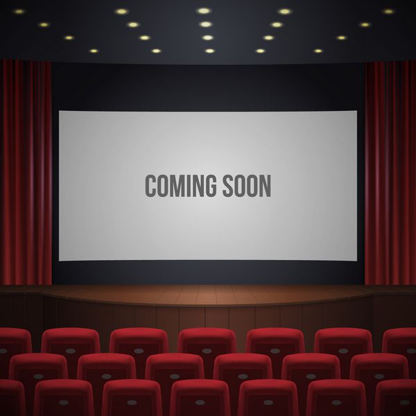 سالن سینما یا تئاتر سکوی چوبی صندلی های قرمز پرده قرمز صفحه عریض با تابلو به زودی عرضه می شود وکتور واقعی