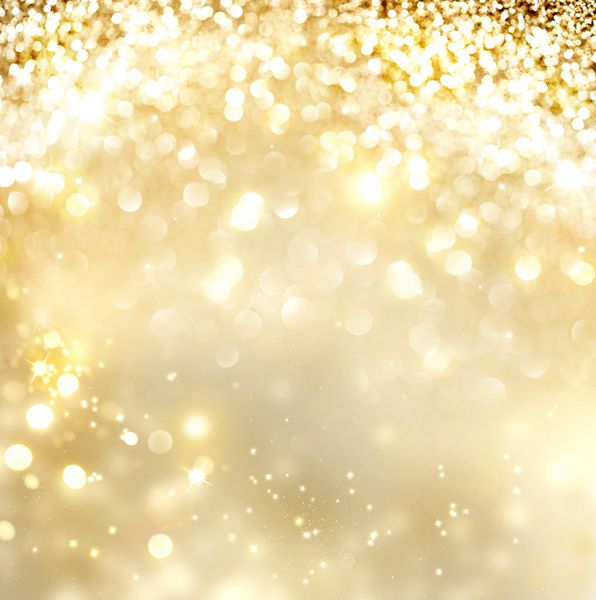 پس زمینه کریسمس پس‌زمینه‌ی پر زرق و برق انتزاعی طلایی و درخشان با ستاره‌های چشمک زن بوکه تار