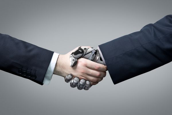 دست دادن تاجر و ربات فناوری هوش مصنوعی