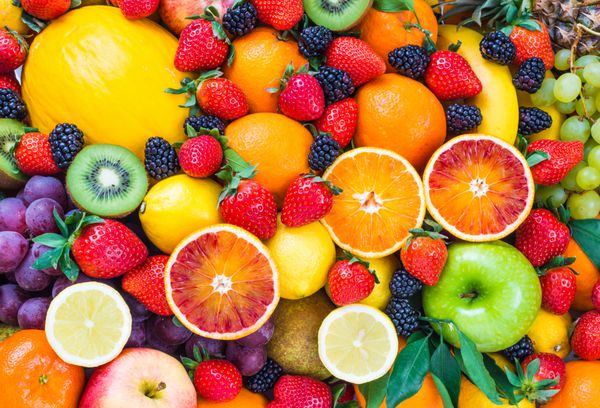 میوه های تازه پس زمینه میوه های مخلوط تغذیه سالم رژیم غذایی میوه های عاشقانه
