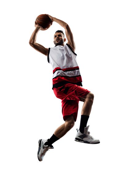 جدا شده بر روی بازیکن بسکتبال سفید در عمل در حال پرواز بالا است