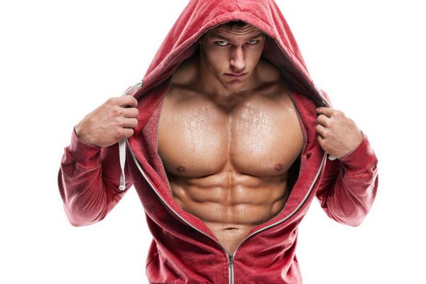 نیم تنه مدل تناسب اندام مرد ورزشکار قوی که شکم شش تکه را نشان می دهد