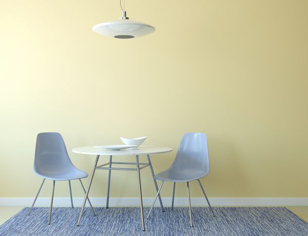 داخلی آشپزخانه با میز و دو صندلی آبی در نزدیکی دیوار زرد خالی رندر سه بعدی