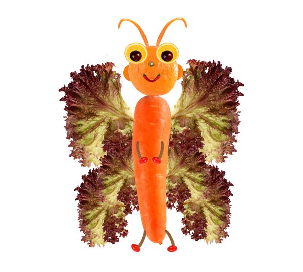 مفهوم غذای خلاقانه پروانه کوچک خنده دار ساخته شده از میوه ها و سبزیجات