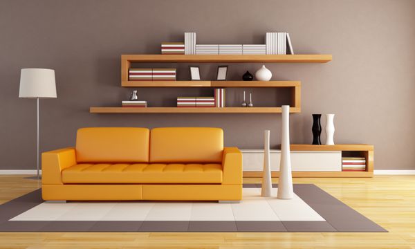اتاق نشیمن نارنجی و قهوه ای با قفسه کتاب چوبی مدرن