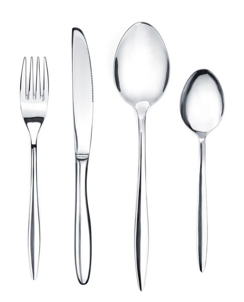 مجموعه ظروف نقره یا تخت چنگال قاشق و چاقو جدا شده در زمینه سفید