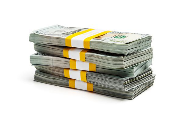 ایده کسب و کار خلاقانه کسب و کار مالی برای کسب درآمد - دسته ای از بسته های 100 دلاری اسکناس اسکناس نسخه 2013 جدا شده روی سفید