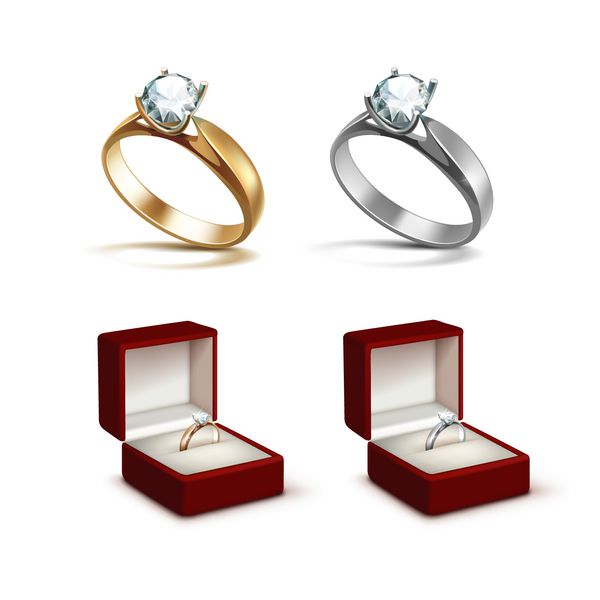 وکتور حلقه نامزدی طلا و نقره با الماس شفاف براق سفید در جعبه جواهرات قرمز از نزدیک جدا شده در پس زمینه سفید