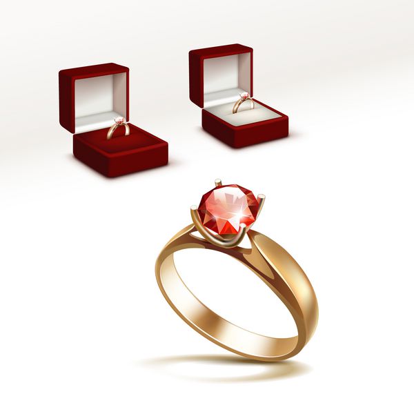 وکتور حلقه نامزدی طلا با الماس شفاف براق قرمز در جعبه جواهرات قرمز از نزدیک جدا شده در پس زمینه سفید