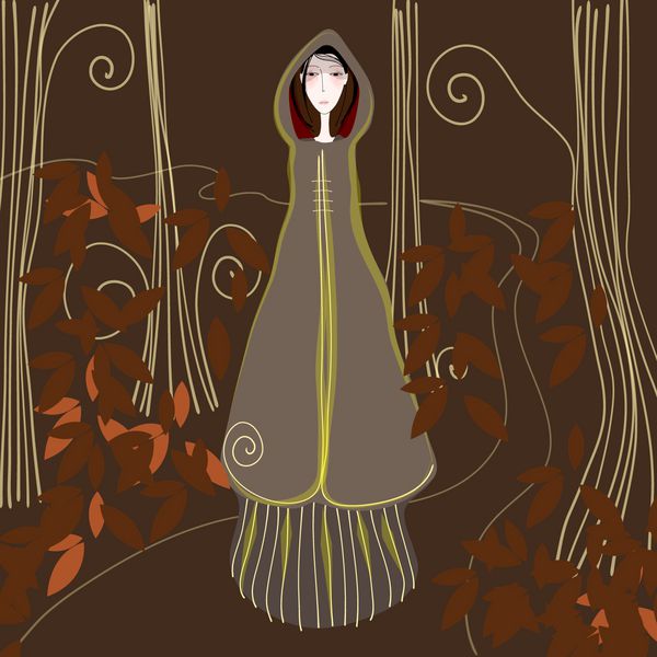 دختر ناز پاییزی در حال قدم زدن در جنگل