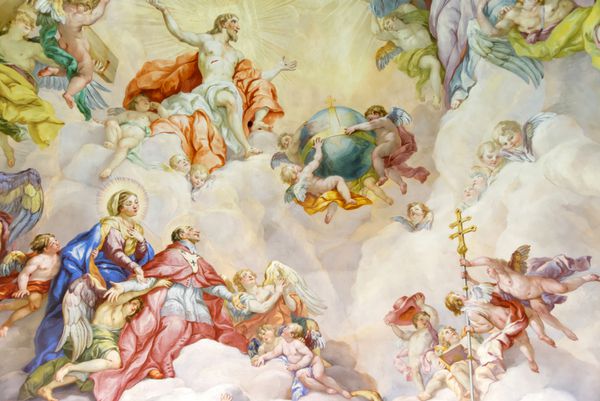 وین اتریش - 23 نوامبر 2013 karlskirche کلیسای سنت چارلز نقاشی های دیواری پر جنب و جوش قدیسان و فرشتگان گنبد طاقدار داخلی وین کارلسکیرچه را تزئین می کنند