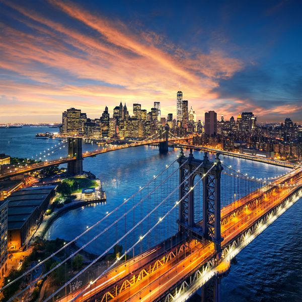 شهر نیویورک - غروب زیبا بر فراز منهتن با منهتن و پل بروکلین