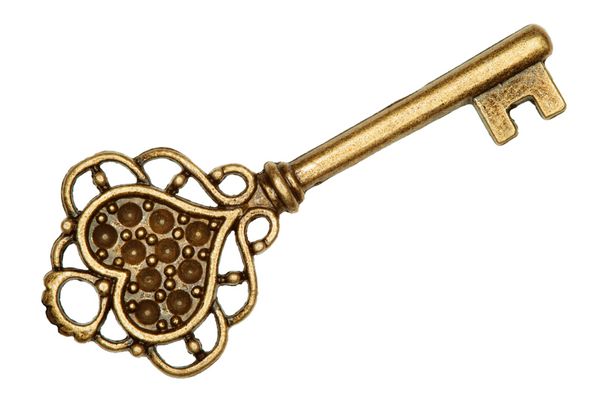 کلید طلایی جدا شده روی سفید