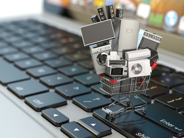مفهوم تجارت الکترونیک یا خرید آنلاین لوازم خانگی در سبد خرید روی صفحه کلید لپ تاپ تصویر سه بعدی