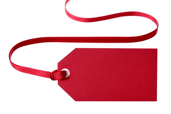 برچسب هدیه با روبان قرمز جدا شده روی سفید