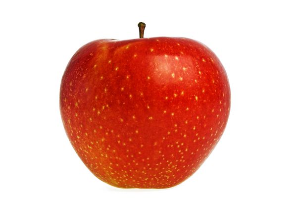 سیب قرمز در پس زمینه سفید