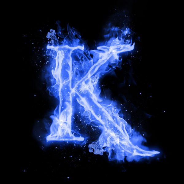 حروف K از چراغ شعله سوزان