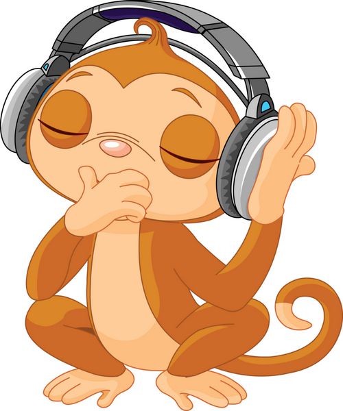 میمون کوچک ناز در حال گوش دادن به موسیقی
