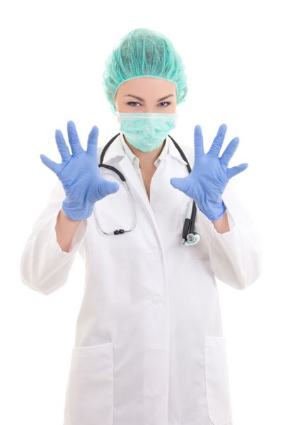 پزشک زن ترسناک با ماسک جراح و دستکش لاستیکی