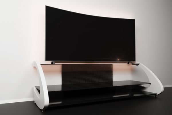 نمای جانبی پایه تلویزیون سفید مدرن و مانیتور تخت در اتاق ماکت رندر سه بعدی