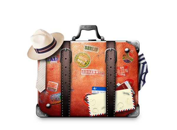 چمدان رترو یک مسافر با برچسب های مسافرتی