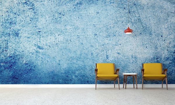 طراحی داخلی اتاق نشیمن دیوار آبی بافت