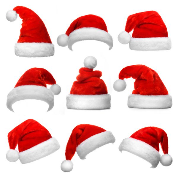 مجموعه کلاه بابا نوئل قرمز جدا شده در پس زمینه سفید