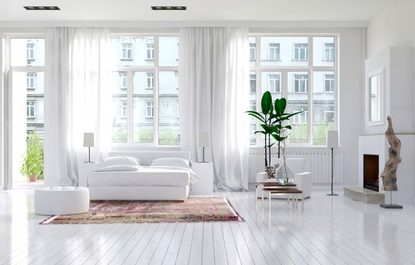 اتاق خواب سفید و تک رنگ چند منظوره بزرگ با شومینه یک تخت خواب دو نفره و پنجره های بزرگ با پنجره های ظریف زیبا در یک آپارتمان لوکس رندر 3d