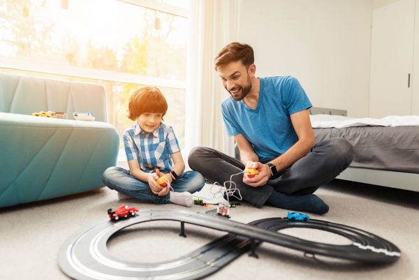 Father and son compete in races with children