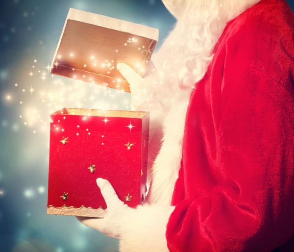 بابا نوئل افتتاح یک هدیه بزرگ کریسمس
