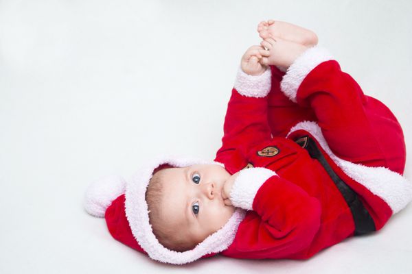 کودک مبارک دروغ گفتن در شکم قرمز و سفید کریسمس سانتا کت و شلوار