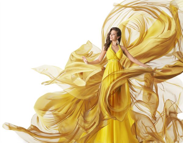 مدل لباس مد زن در لباس پارچه ای جریان لباس لباس بر روی باد زرد سفید