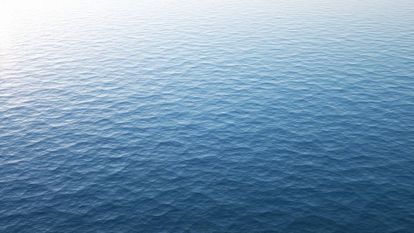 سطح آب پاک اقیانوس دریا و یا غروب آفتاب امواج و موجها رزولوشن 8K تصویر رندر 3D