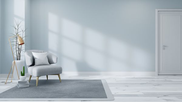 فضای داخلی اسکاندیناوی اتاق نشیمن مبل خاکستری روشن با لامپ طلای روی کفپوش سفید و دیوار آبی رندر سه بعدی