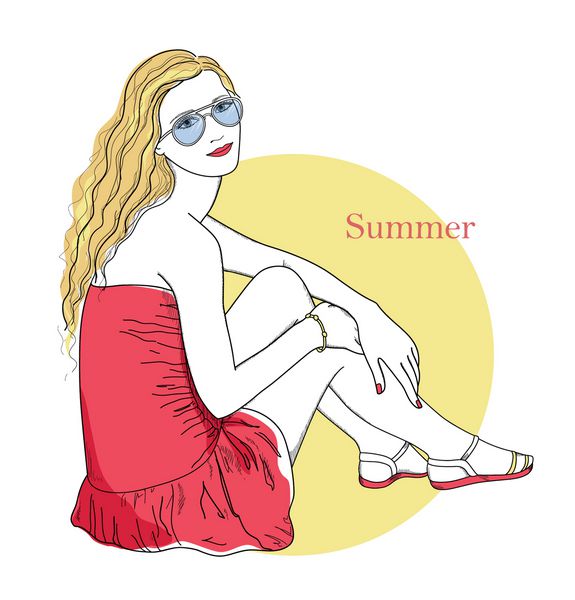 دختر با لباس قرمز و عینک هایی که در غروب آفتاب تابستان نشسته است