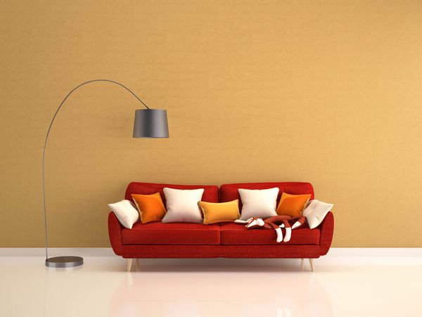 کاناپه قرمز با بالش و لامپ کف در رندر دیواری زرد