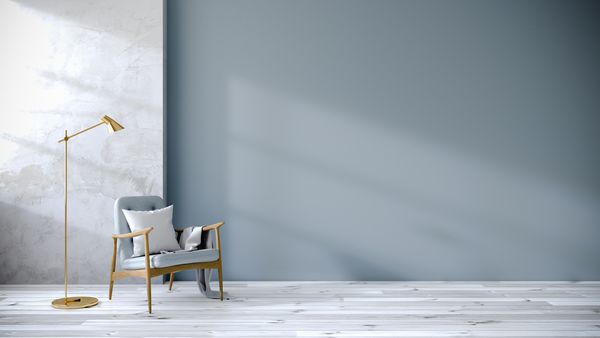 فضای داخلی اتاق زیر شیروانی و پرنعمت اتاق نشیمن صندلی های آبی رنگ روی کفپوش سفید و دیوار آبی رندر سه بعدی