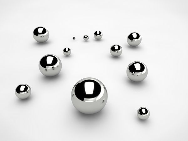 توپ های فلزی پراکنده در سطح کره ای با اندازه های مختلف ایده بی نظمی و آشوب انتزاع تصویر جدا شده در پس زمینه سفید redering 3D